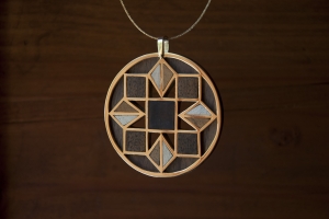 Ciondolo in oro giallo 750/1000 con i...