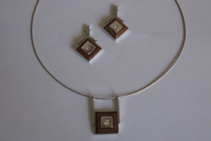 Parure in oro bianco 750/1000 con ins...