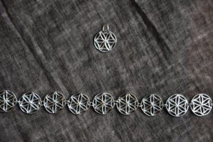 Bracciale e ciondolino con "roso...