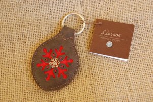 Portachiavi in cuoio e argento 925/10...